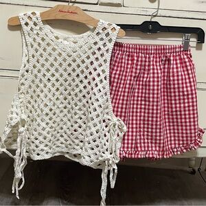 Sale! Chic white crochet top paired with red gingham plaid ruffled shorts.